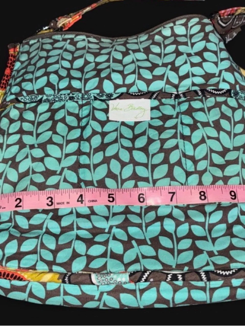 Vera Bradley Quilted Bag with Teal Floral Pattern on Brown